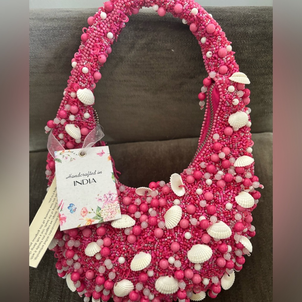 Viral pink sequin and seashell handbag